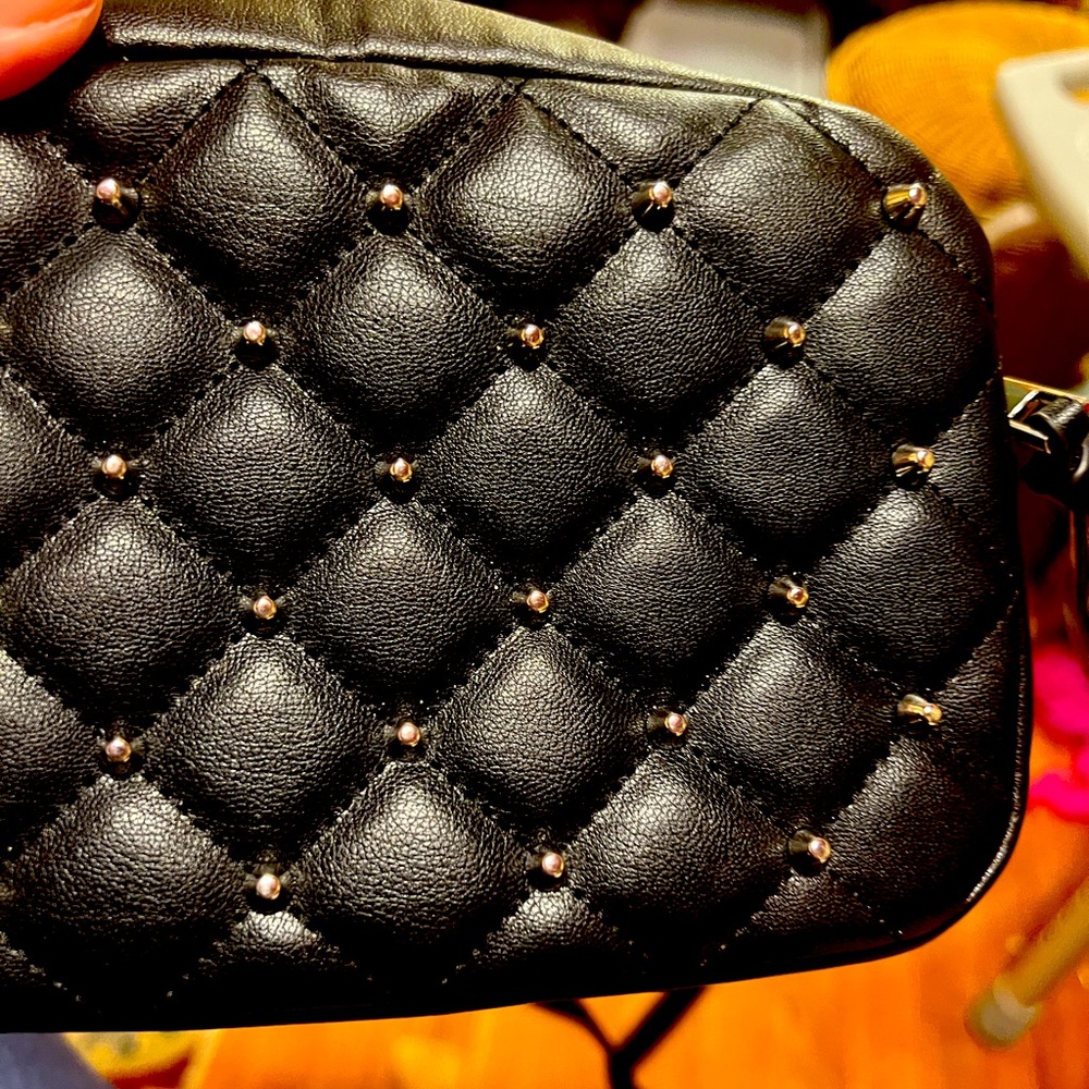 Rebecca Minkoff quilted, studded black crossbody bag.